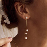 Pendientes de perlas con cadena