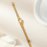 Reloj metálico de esfera ovalada