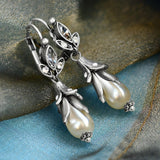 Pendientes florales de plata y perla