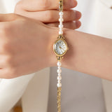 Reloj con perlas y esfera lágrima