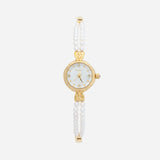 Reloj dorado con cuentas perladas