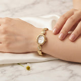 Reloj de acero dorado elegante